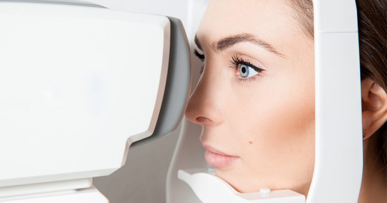 Woman getting an eye test done