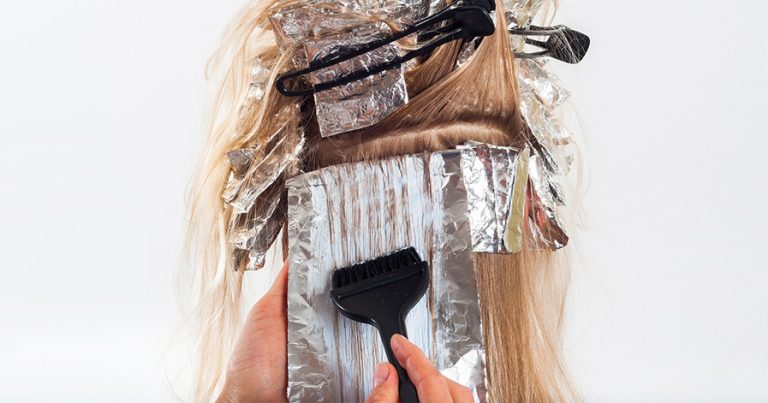 Woman getting her hair dyed