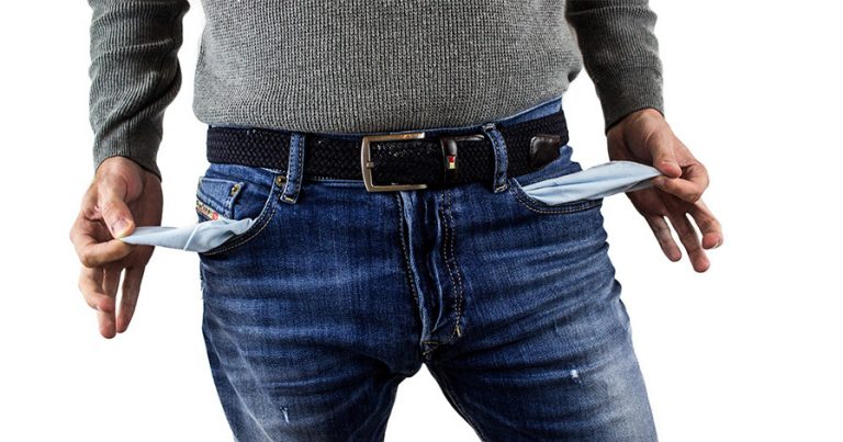 Man with pockets turned out