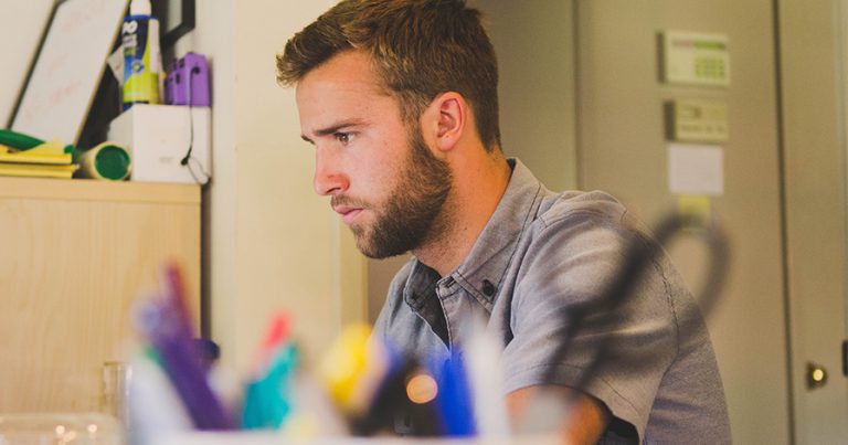 Man looking at computer screen