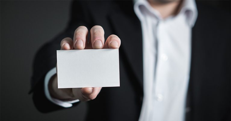 Man with blank business card