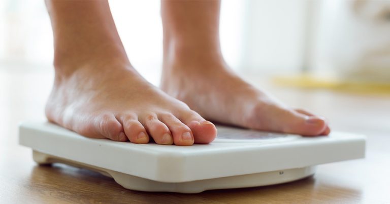 Standing on scale