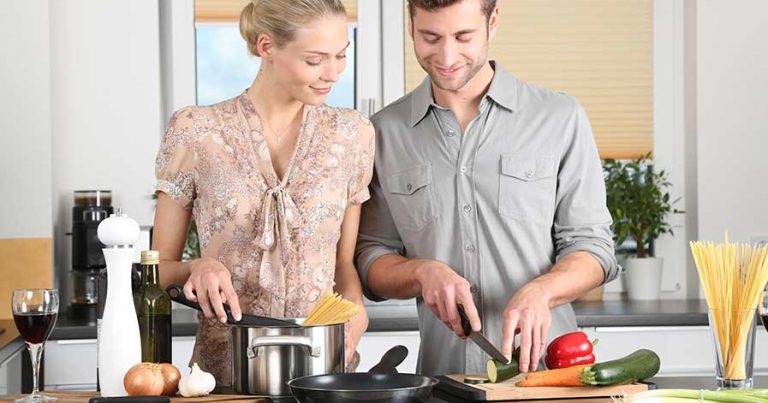 A couple cooking in their kitchen