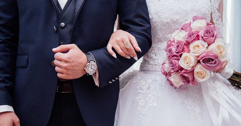 A bride and groom, newly married.