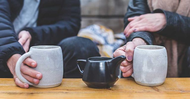 A couple are out for coffee on a blind date
