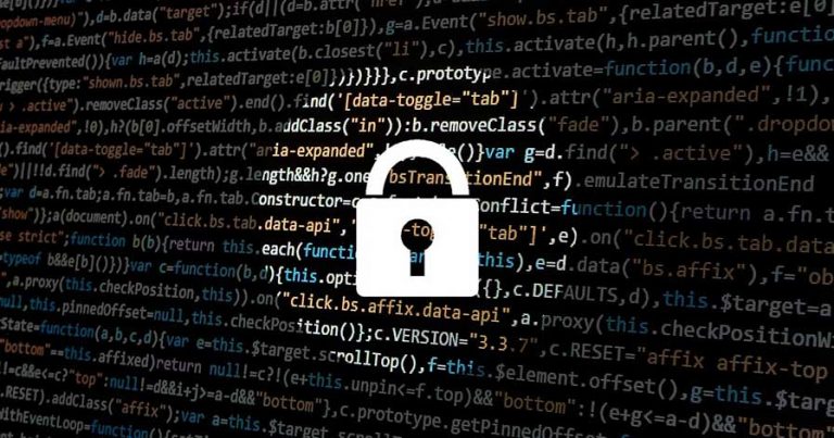 An image of a key lock and lines of code.