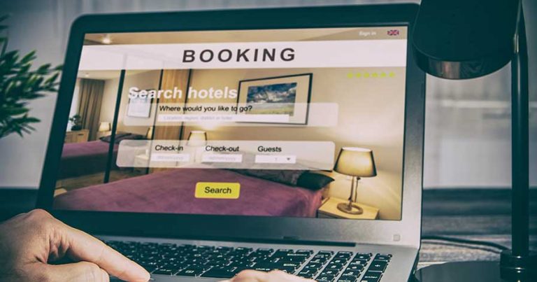 A laptop screen showing a hotel booking website