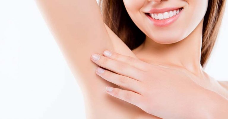 Someone toucing their freshly shaven armpit.