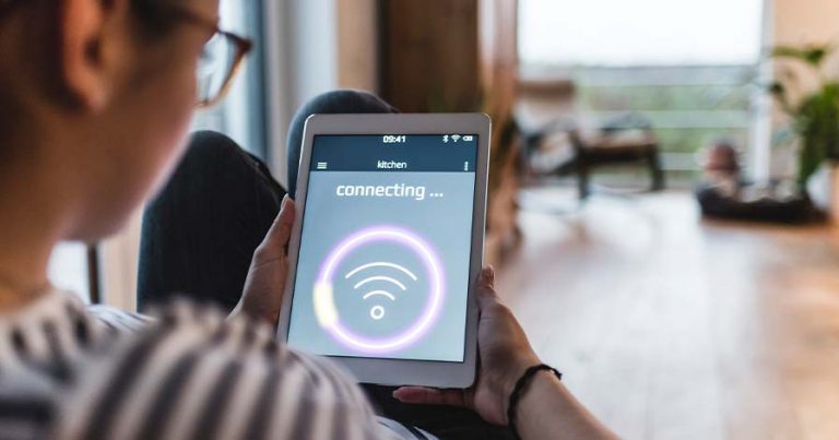 A Wi-Fi icon on a person's tablet as they connect to a Bluetooth device.
