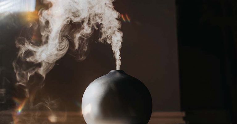 An oil diffuser on a table.
