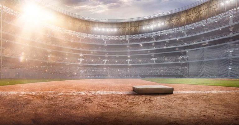 Inside a baseball stadium from the perspective of first base.