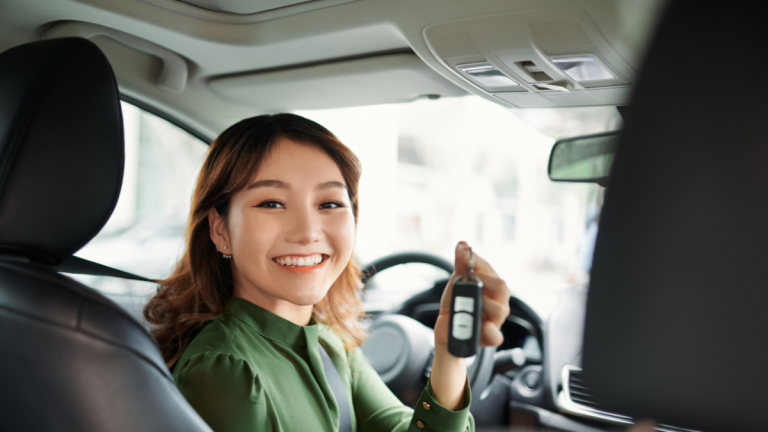 A woman buying a car.