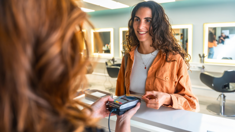 Woman Holding Credit Card